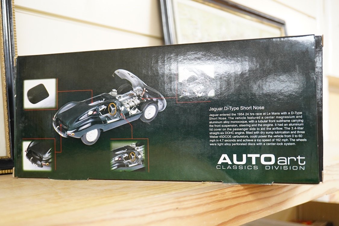 Two boxed Auto Art 1:18 scale Jaguar racing cars; a D type Jaguar and a Jaguar XK-SS